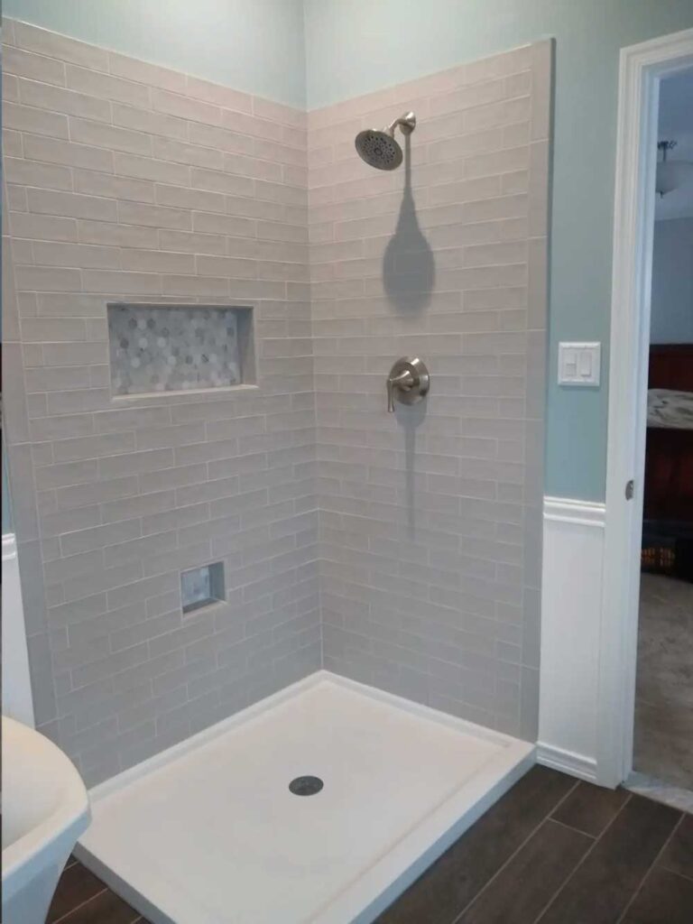 Tiled bathroom shower with two tiled niches